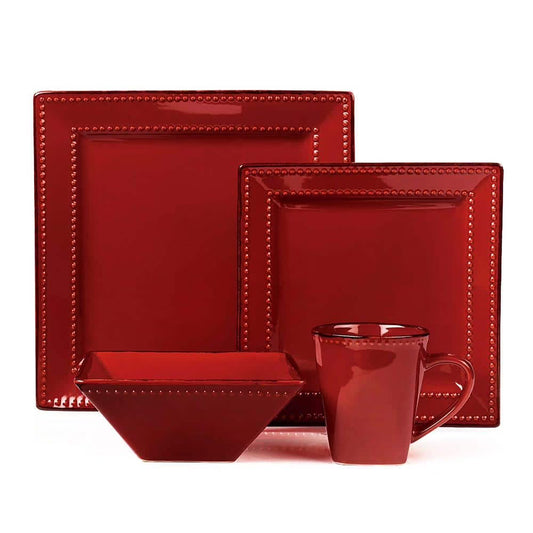 Square red ceramic dinnerware with beaded rims: dinner plate, salad plate, square bowl, and mug arranged together