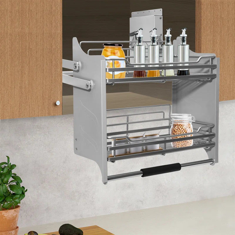 installed pull down shelf on wood board cabinet with dish rack deployed with jars bottles inside