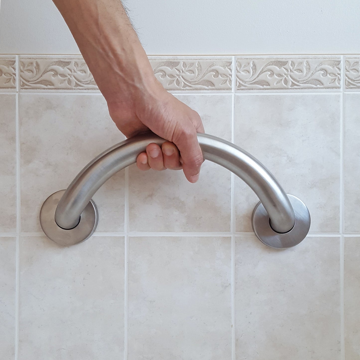 crescent grab bar in shower