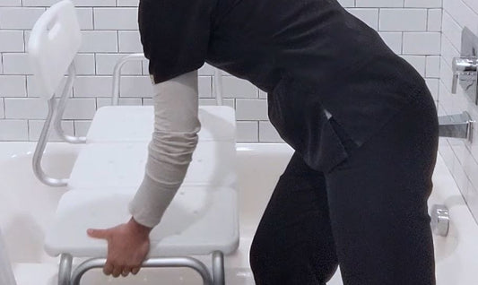 woman using tub transfer bench