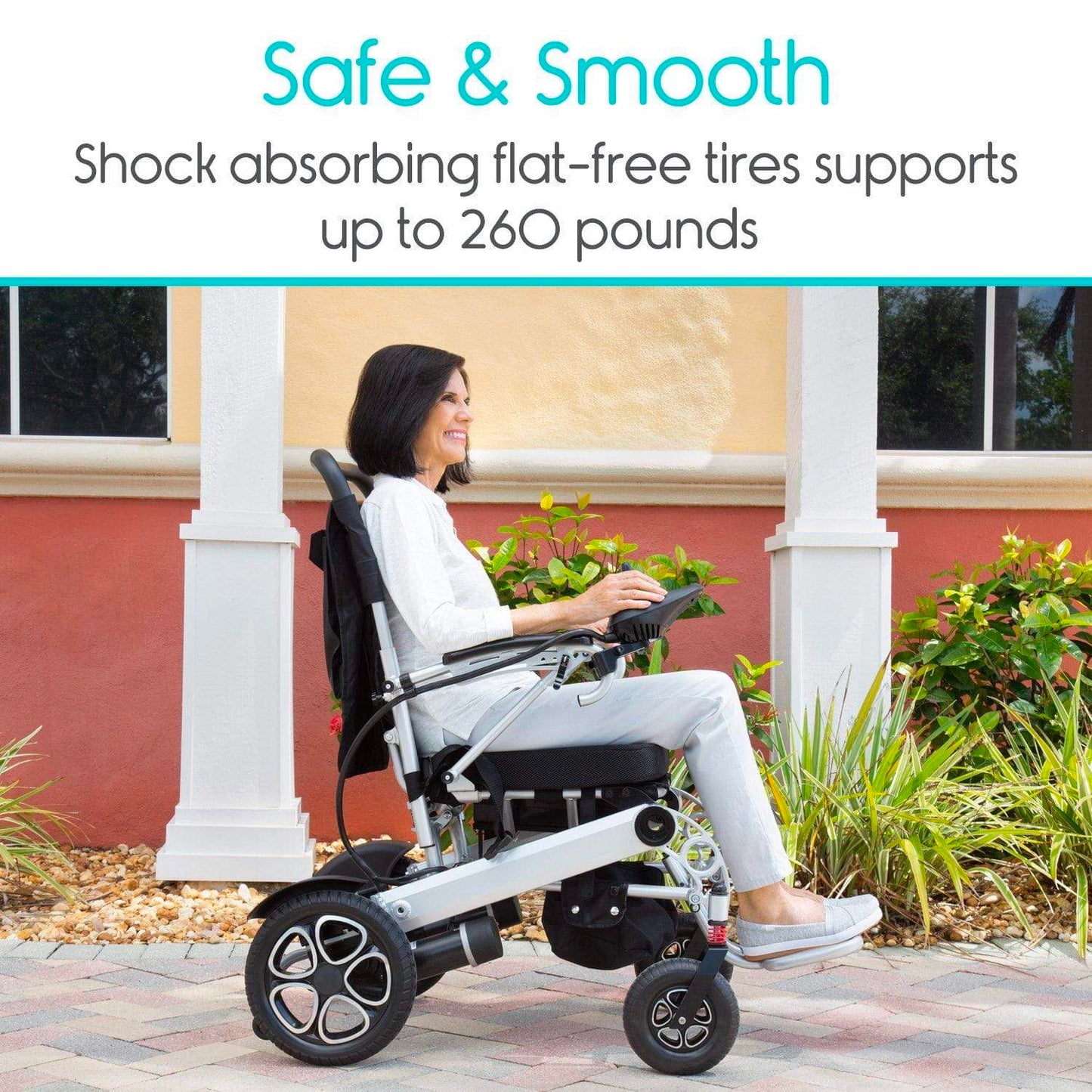 woman driving wheelchair outside