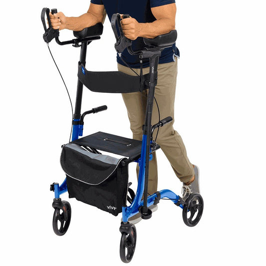 Man walking upright with the blue Upright Walker rollator, forearms resting on padded supports at elbow height so he stands tall instead of hunching forward