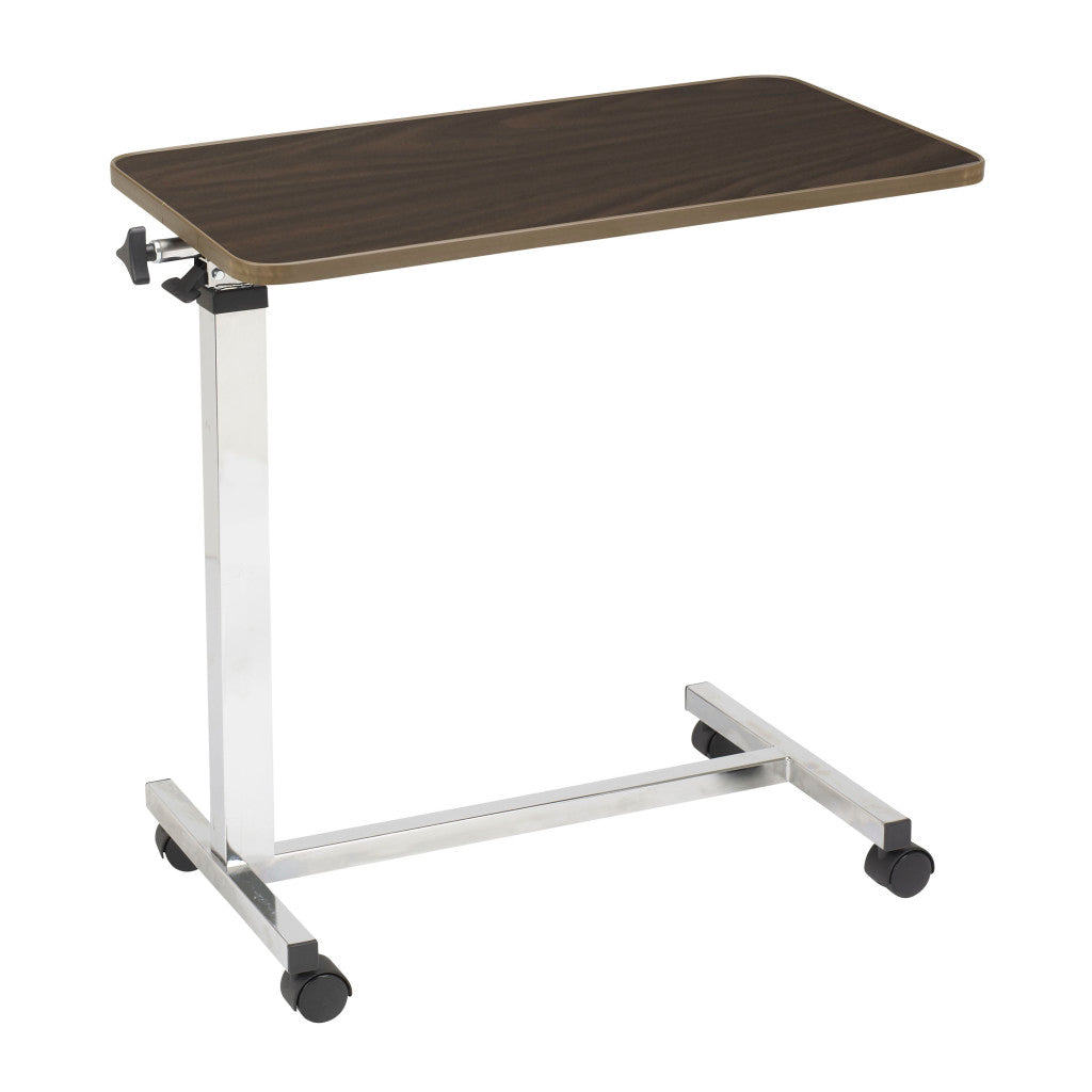Tilt-top overbed table with the tilt knob under the top and the column at one end, so the base rolls under the bed