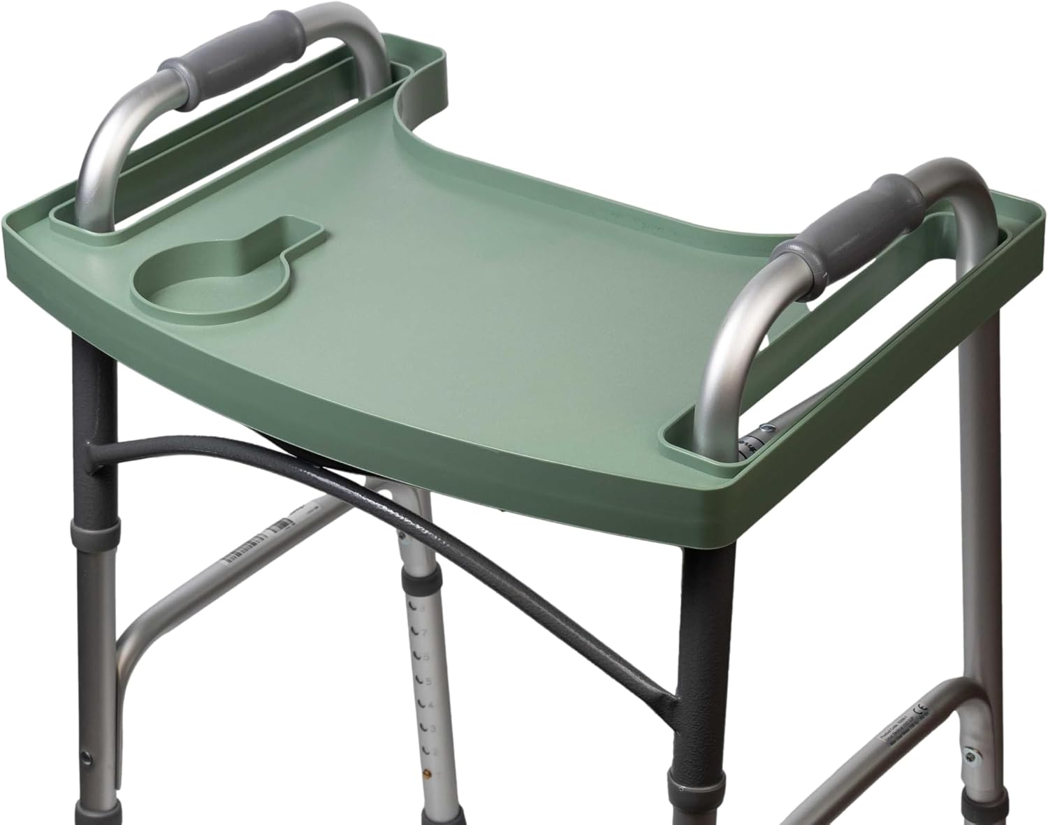 Sage green Sigo walker tray attached to a standard folding walker, with a molded cup holder and raised edges that keep food and drinks from sliding off.