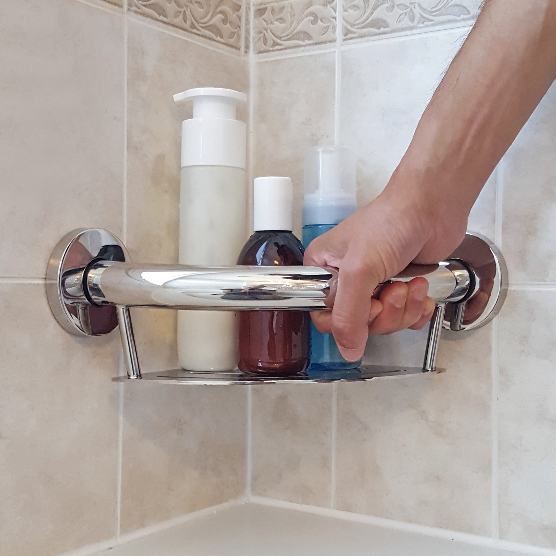 person using grab bar shelf in shower