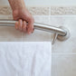 person using towel grab bar