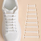 Elastic Shoelace Bands placed in shoe and with a set beside the shoe