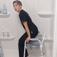 woman using a shower chair