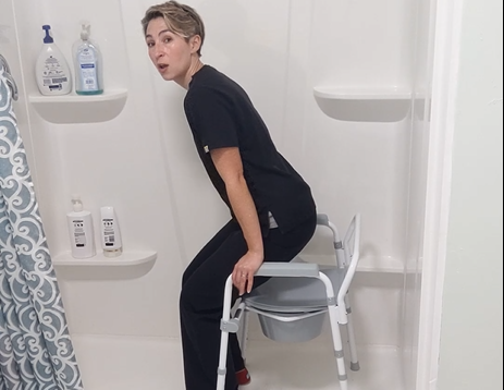 woman using a shower chair