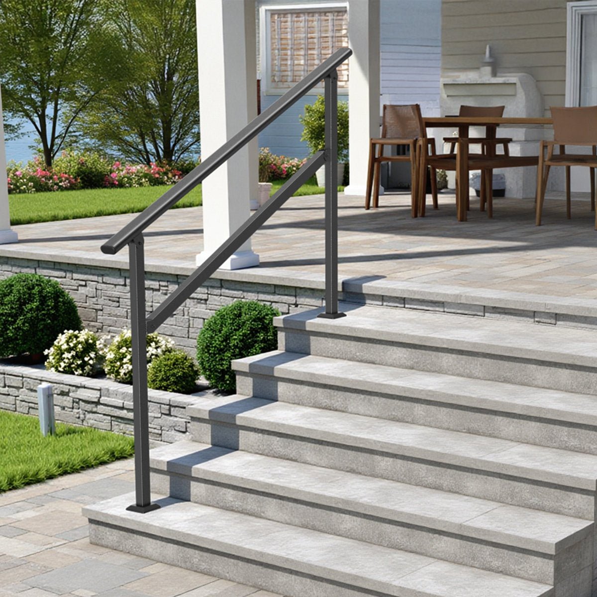 5 step outdoor stair railing with a 68.9 inch black handrail bolted to stone patio steps, giving support the full length of the steps.