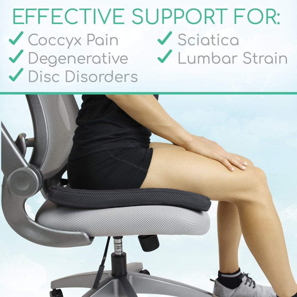 person sitting on office chair on top of Honeycomb Gel Seat Cushion