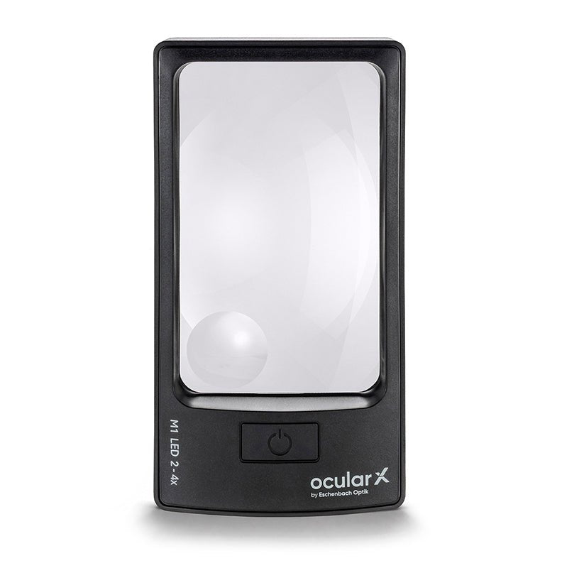 ocularX M1 2x rectangular LED hand magnifier, 114 x 70 mm lens with a 4x bifocal spot for reading labels and fine print.