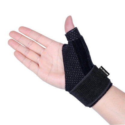 Black reversible thumb spica splint worn on an open hand, thumb and wrist straps fastened, with all four fingers left completely free to move.