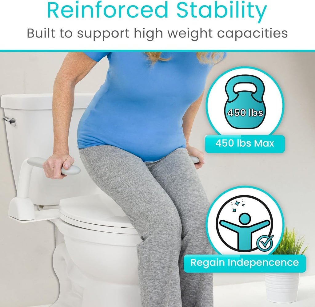 Woman pushing up from the toilet using the Vive rail armrests, rated to 450 lbs for reinforced stability.