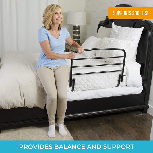 bed rail on bed with woman