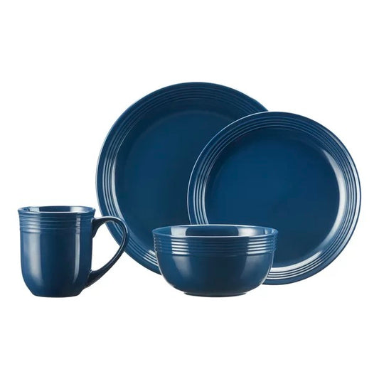 blue plates, bowl, and cup