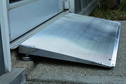 Adjustable height threshold ramp shown at a doorway