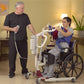 sit to stand lift with person using it