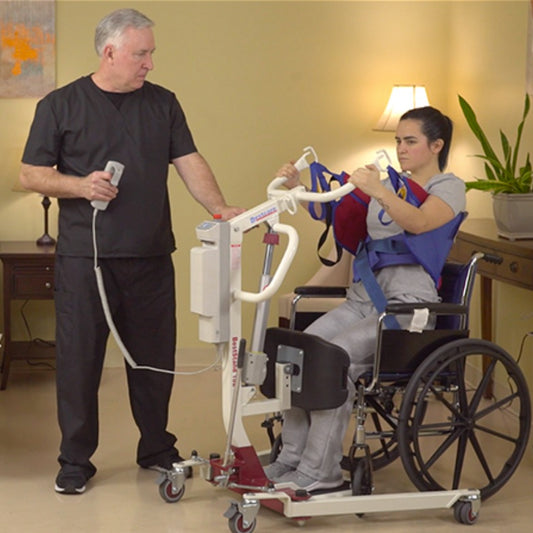 sit to stand lift with person using it